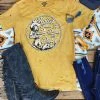 Country Deep Hotter Than A 2 Dollar Pistol Distressed Mustard Tee Tees